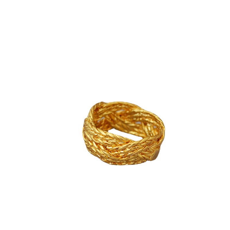 European and American niche fashion, individual and trendy retro brass gold-plated hollowed-out twist woven ring index finger ring, cool and trendy girls Item Picture