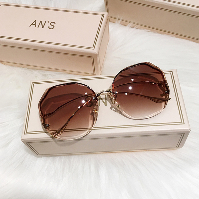 New fashionable bezel-less trimmed sunglasses for women, multi-deformation metal curved temple, popular street style sun protection sunglasses Specification image