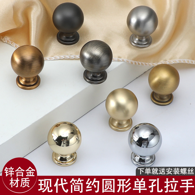 Light luxury Italian solid cabinet door, round single-hole handle, gold and black French simple cabinet and wardrobe drawer handle details Picture