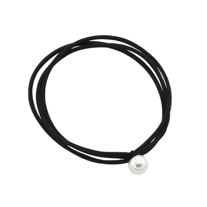 The simple and elegant pearl hair tie from Dongdaemun, South Korea, is a basic black leather band hair tie accessory that is versatile for women Item Picture