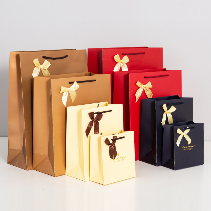 Bow paper bags, wedding and festival gift bags, clothing shopping handbags, candy jewelry packaging bags, printed logos Application Scenario