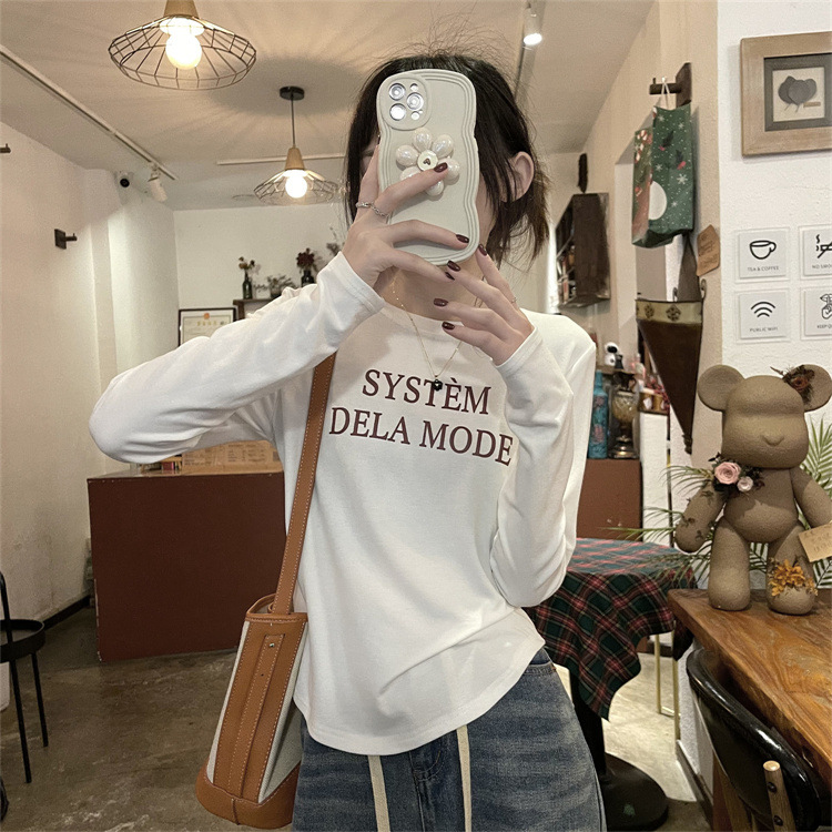 A unique and irregular long-sleeved T-shirt base layer for women, with a new design sense and a slimming top as an inner layer Application Scenario