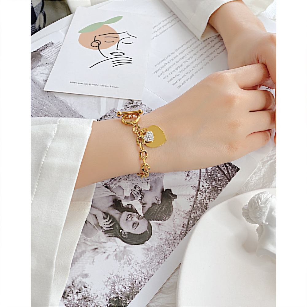 OPK Accessories wholesale: European and American fashion ins heart-shaped stainless steel jewelry, personalized OT buckle, high-end titanium steel bracelet for women details Picture