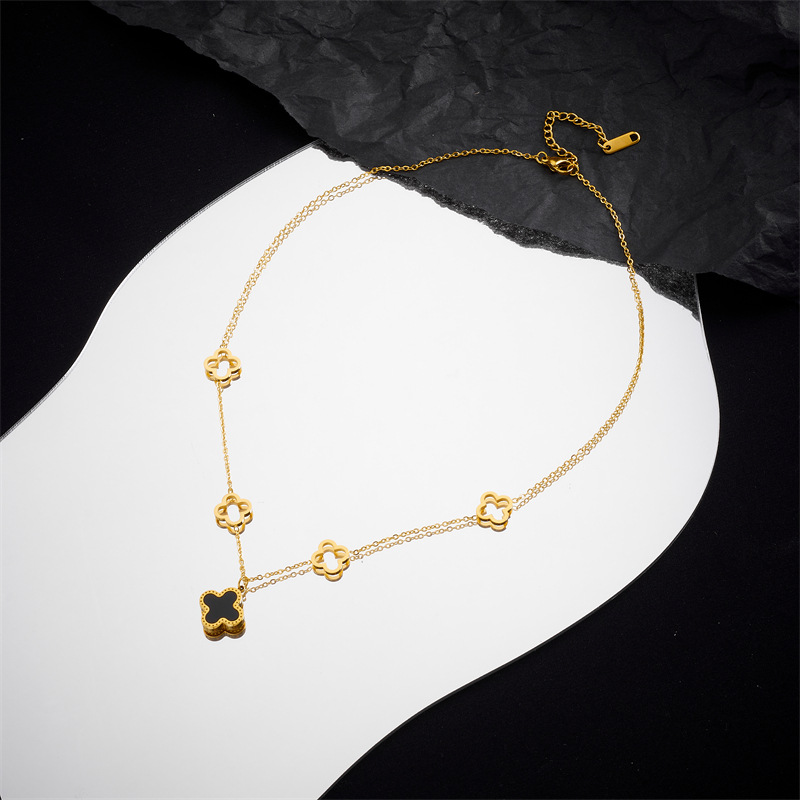 A niche design double-sided four-leaf clover titanium steel necklace with a fashionable and elegant feminine touch, featuring a light luxury hollowed-out flower mother-of-pearl collarbone chain and a personalized accessory Specification image