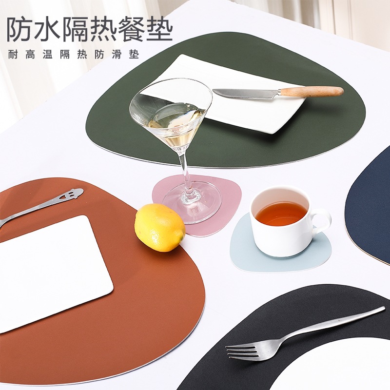 Direct supply of double-sided, two-color teardrop-shaped PU leather placemats and PVC Western dinner plate pads from the manufacturer details Picture