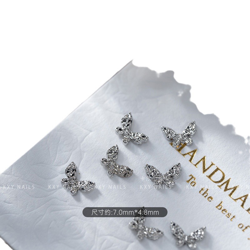The alloy butterfly bow tie series of nail art accessories is a popular three-dimensional bestseller. It is a high-end and light luxury nail accessory with a butterfly diamond pattern Item Picture