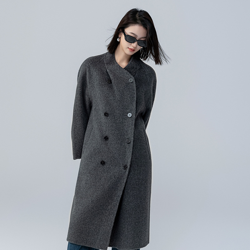 The new stand-up collar double-sided cashmere coat for women in the spring and autumn of 2025 is a long cocoon-shaped alpaca wool woolen coat. It is a popular woolen coat