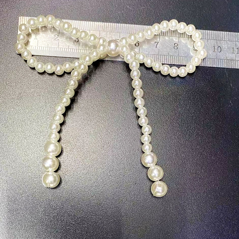 Wholesale of Japanese and Korean jewelry, clothing, imitation pearl bow accessories, shoes, hats, hair accessories, wedding dresses, clothing, bags, and decorative accessories Application Scenario