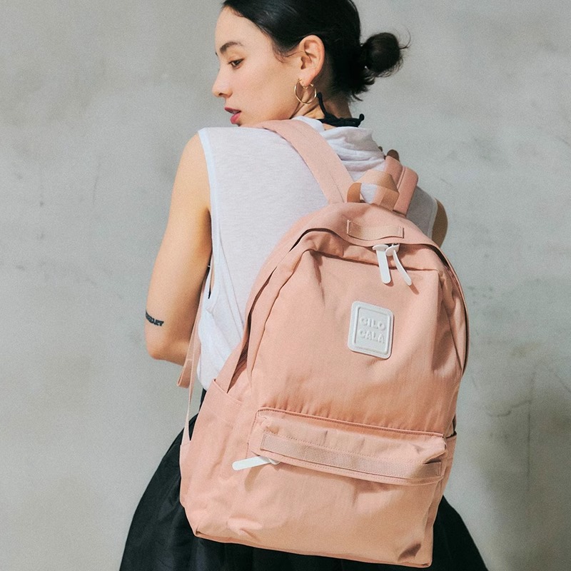 New Japanese-style solid-color nylon bag, lightweight and large-capacity girls' backpack, water-resistant travel backpack for primary and middle schools Application Scenario