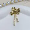 Copper-plated real gold with slightly inlaid zircon bow, mobile phone necklace, pearl necklace, pendant, DIY accessory Application Scenario