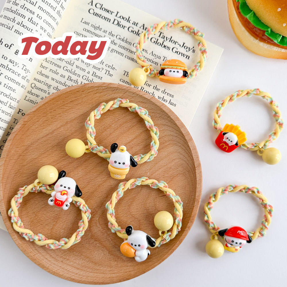 A cute cartoon cream-colored puppy hair tie and a sweet girl with a ponytail at the back of her head