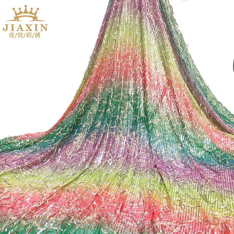佳欣织绣2021春夏新款竖条须须印彩虹条亮片绣花女装连衣裙面料详情图5