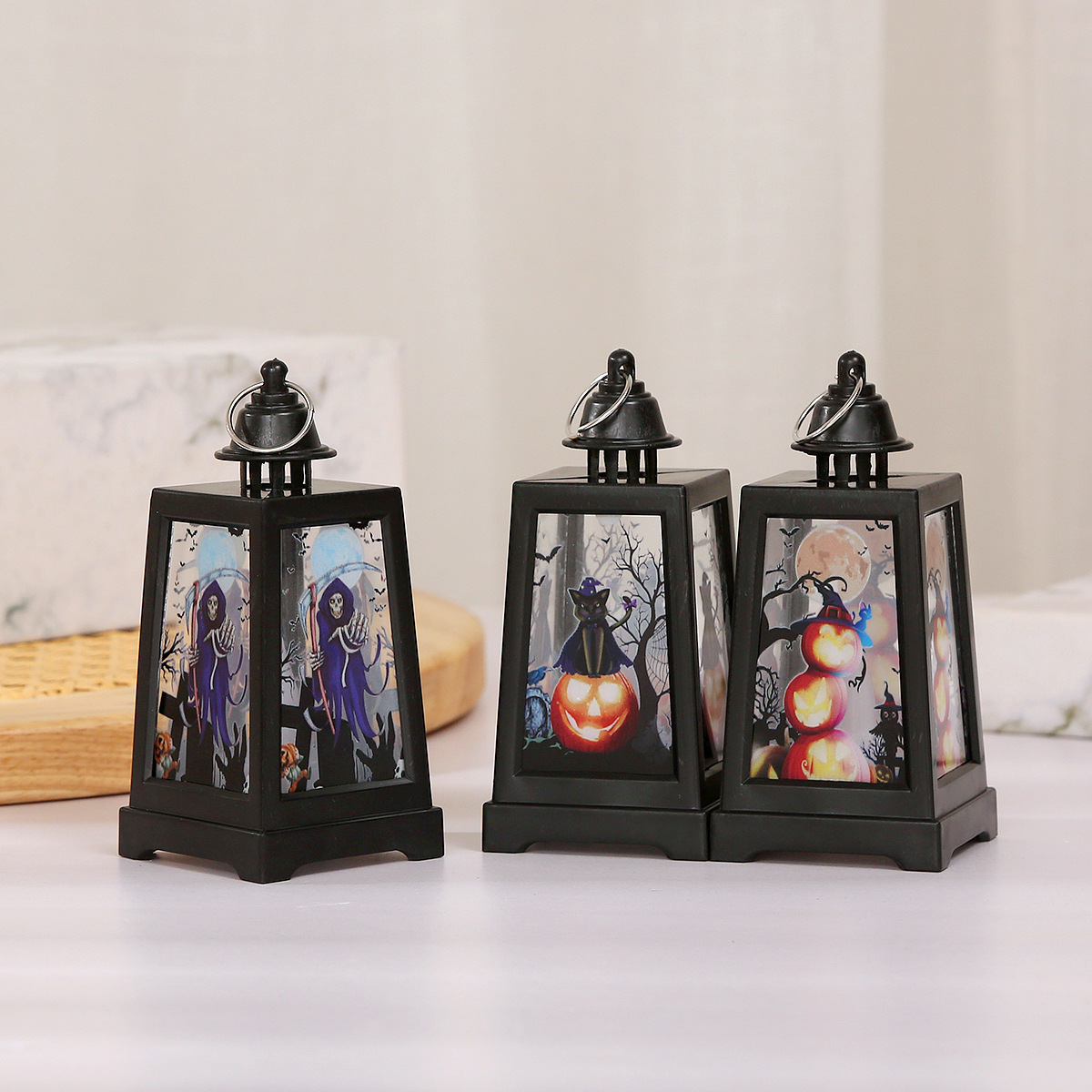 Cross-border exclusive LED electronic candle lights for Halloween atmosphere decoration, wind lanterns, retro ghost pumpkin props and ornaments Application Scenario