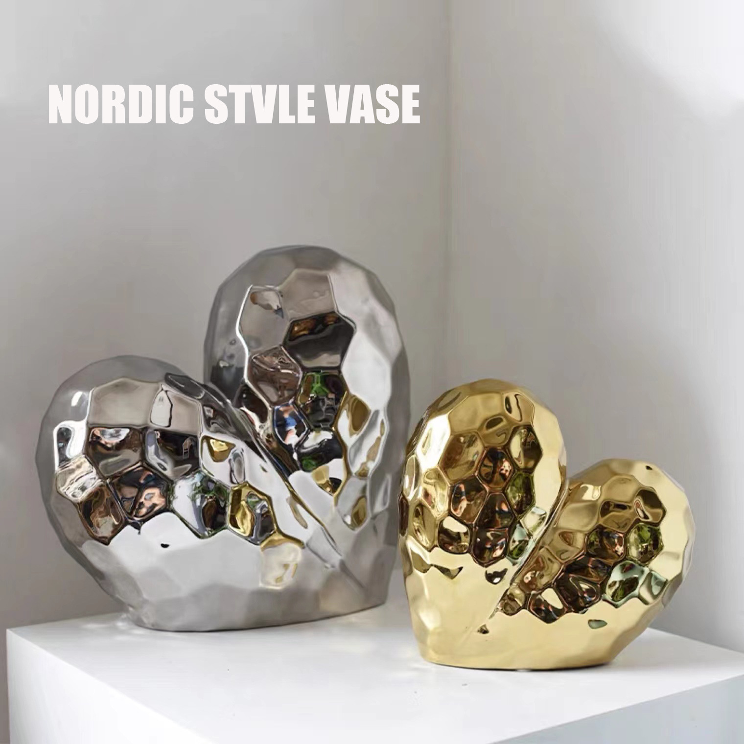 A modern, simple, pure electroplated gold and silver seven-color art in ins style heart-shaped model room living room display gift with a theme of love