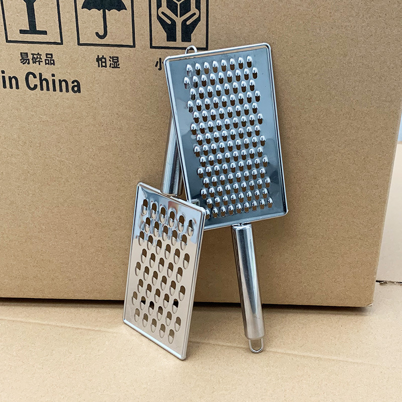 Stainless steel generous radish planer small hole big hole dual purpose planer round pipe steel handle multi-function fruit and vegetable grater Application Scenario