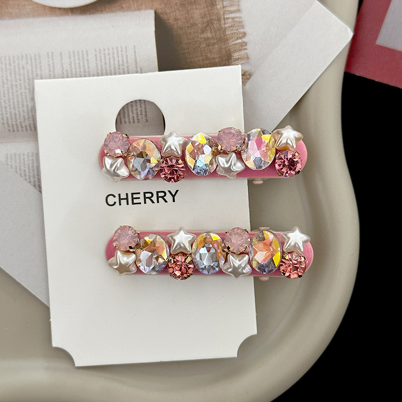 Close-up of Pink Flash Hairpin showing zircon details