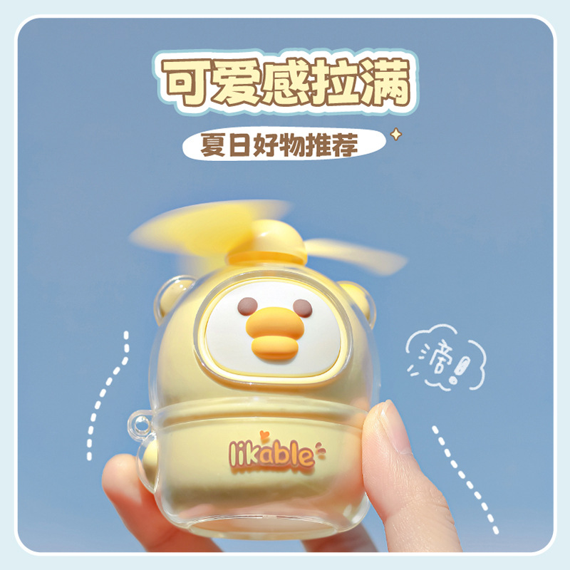 2023 nuevo ventilador de verano creativo lindo mini pequeño pato amarillo de mano recargable ins niñas estudiantes moe
