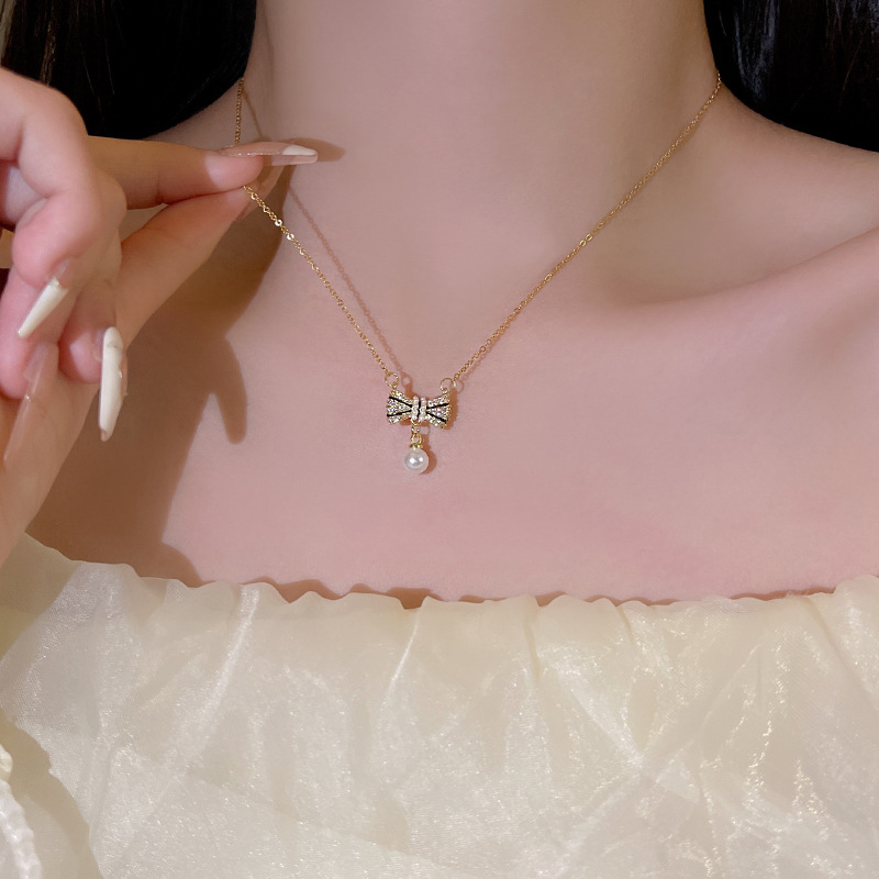 Summer chanel-style bow pearl necklace, super fairy-like, sweet and unique titanium steel collarbone chain, the same accessory as the Internet celebrity