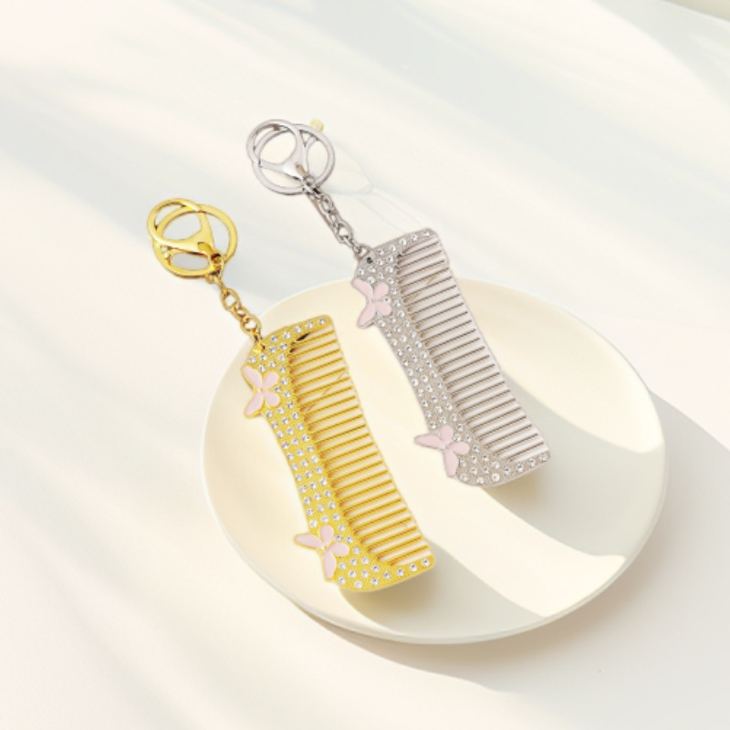 Cross-border creative design of diamond-encrusted combs, car key chains, women's alloy butterfly key chains, car bag hanging accessory boxes, alloy combs, key chain pendants, diamond-encrusted key chains, combs details Picture