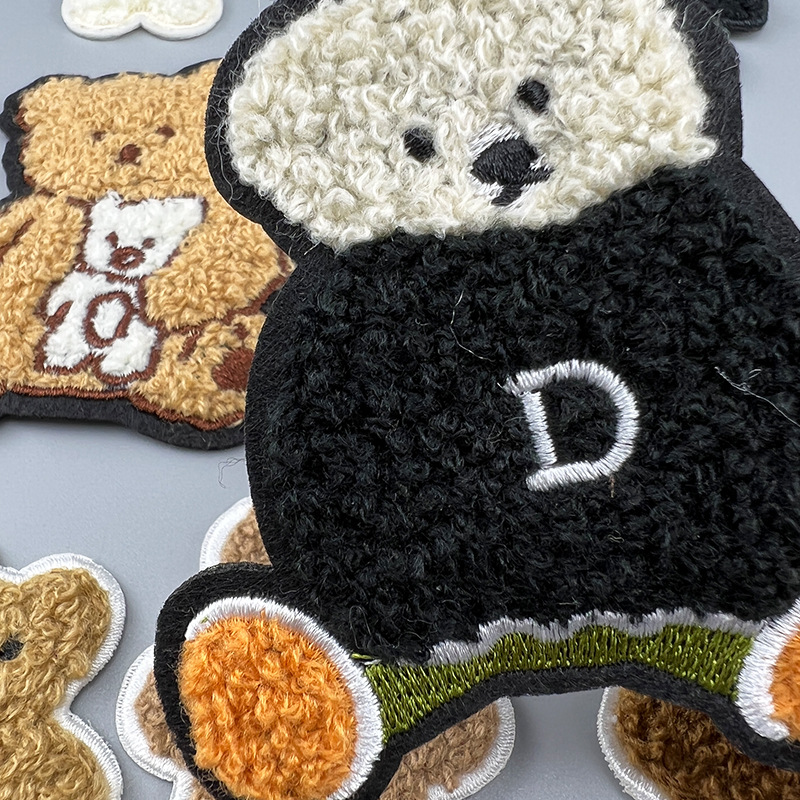 Towel embroidery, cartoon plush bear fabric, sticker accessories, Fat Year accessories, wholesale in stock, embroidery, computerized embroidery, label sticker fabric Specification image