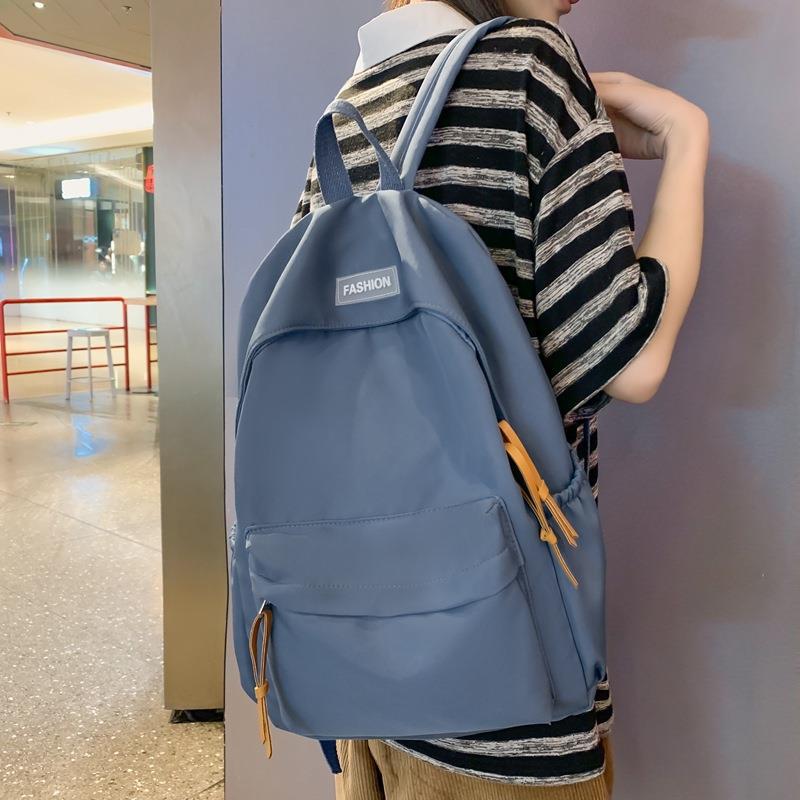 Korean schoolbag for girls, ins forest-style versatile backpack, simple Korean version, high school and junior high school birthday design, high appearance level backpack details Picture