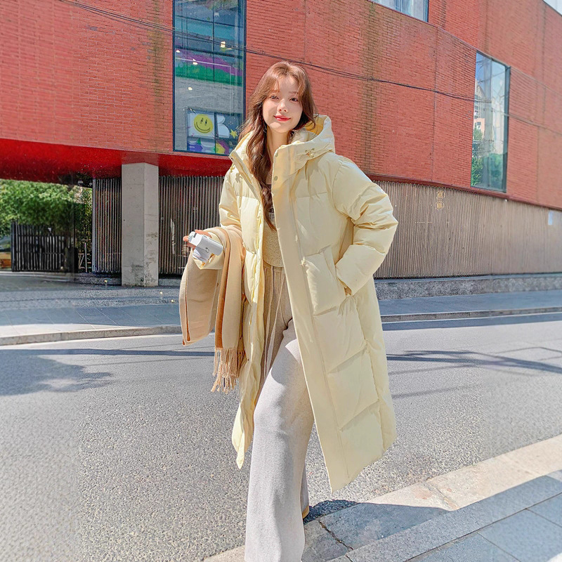 The new Central Academy of Drama down jacket with a high-end feel is a long, knee-length, thickened winter, warm and loose couple coat for both men and women details Picture