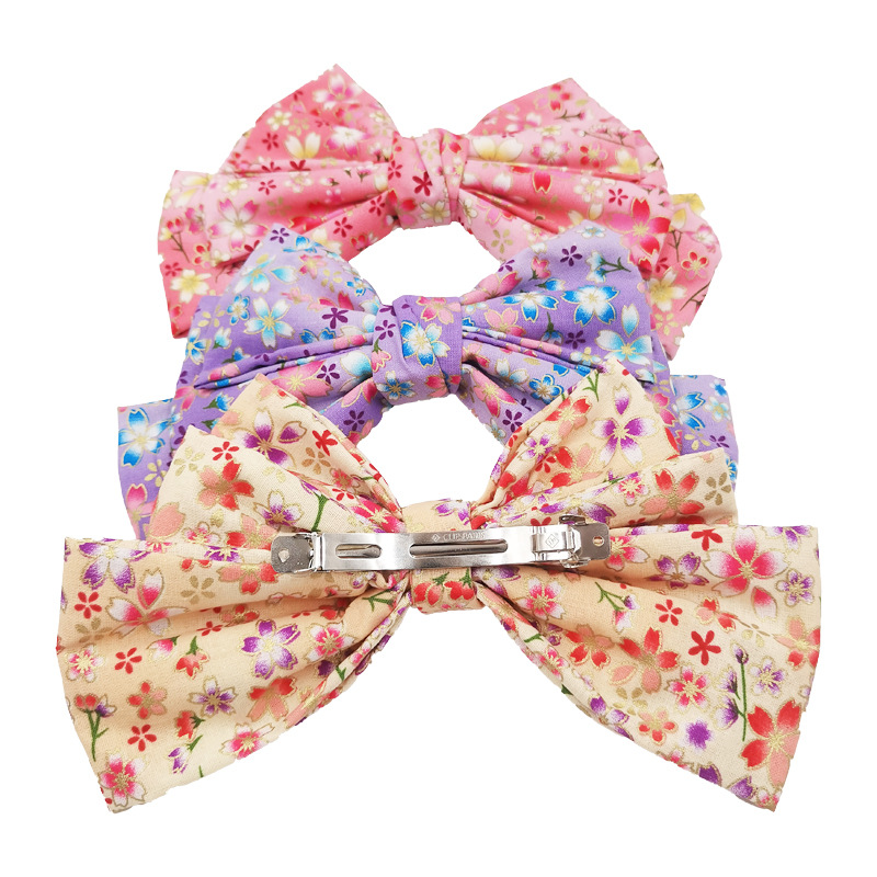 Qiwei Accessories Exclusive Qiwei Accessories Exclusive New Hair accessory fabric Floral Print Bow ponytail Hair clip for women Item Picture