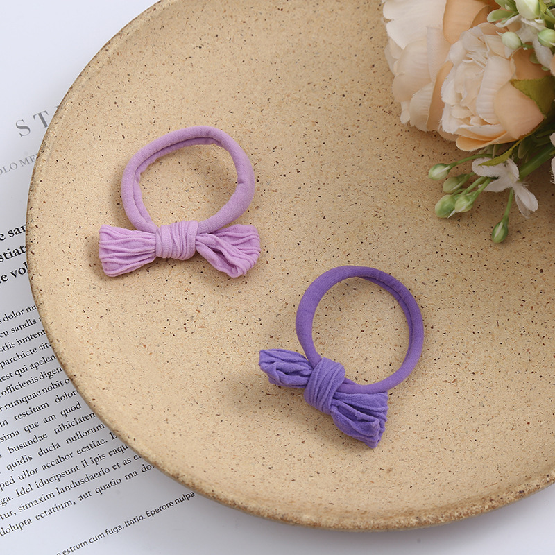 Korean version hair tie creative macaron-colored bow hair tie seamless jacquard hair tie girls' hair tie wholesale Application Scenario