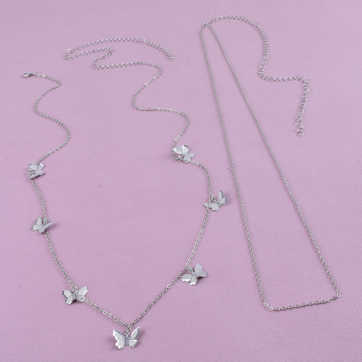 Qifu's new cross-border jewelry from Europe and America is fashionable and versatile. It features a sweet and cool, spicy girl style butterfly pendant with a unique double-layer tassel Application Scenario