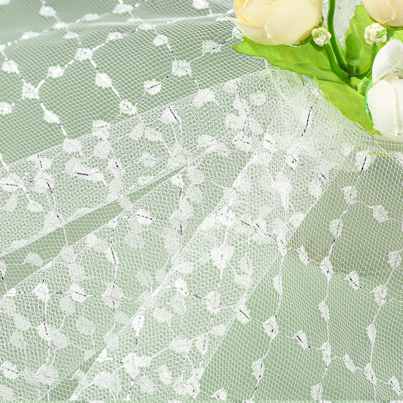 In stock: nylon silver thread children's clothing, mesh fabric, dress, warp knitted mesh fabric, hexagonal embroidered mesh fabric, thin mesh details Picture