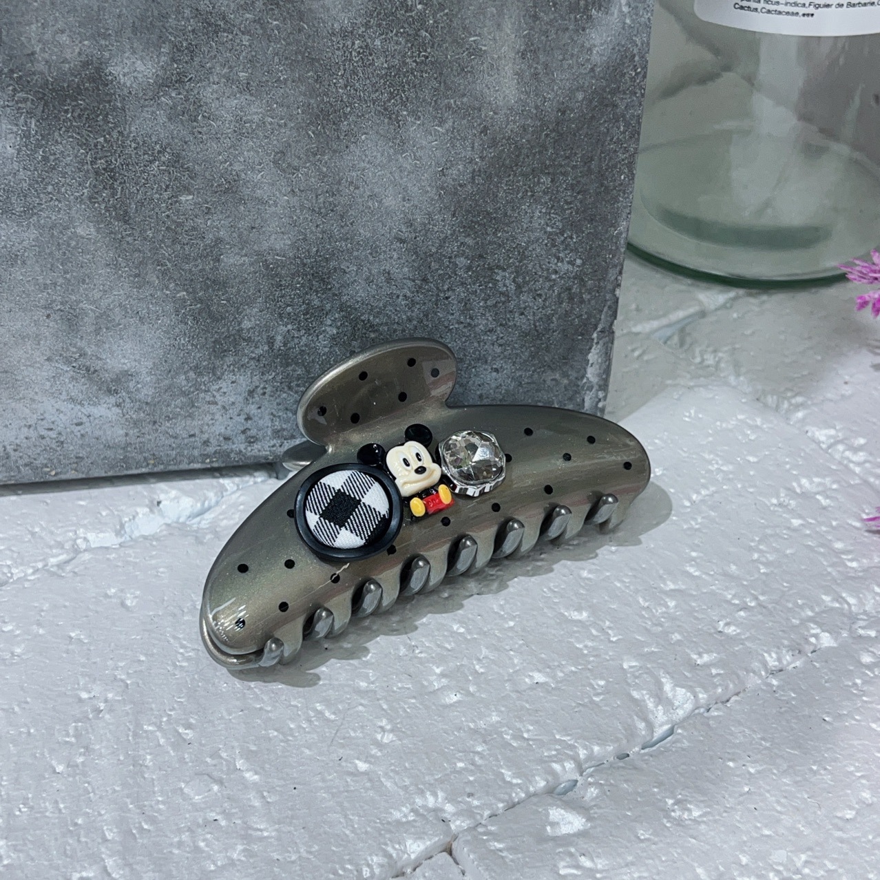 A new black and white polka dot Mickey Mouse bow letter hair clip from South Korea, a fashionable and high-quality shark clip hair accessory for women details Picture