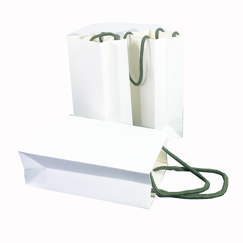 New trapezoidal personalized jewelry tote bag, the same style as four-leaf clover, white paper bag with V-shaped bottom and thickened, high-end jewelry bag Item Picture