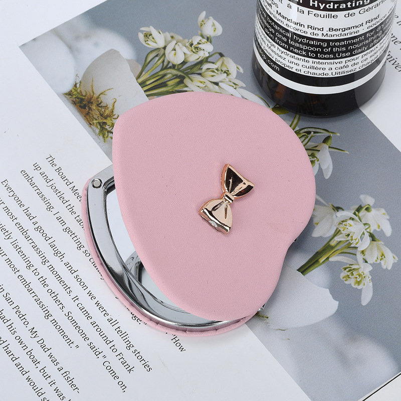Customized creative portable mirror, double-sided three-dimensional folding portable round makeup mirror, customized pattern logo, factory direct sales details Picture