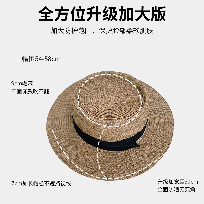 A flat-topped straw hat, a straw woven hat, a women's summer top hat, a wide-brimmed sun-protective hat, a beach hat details Picture