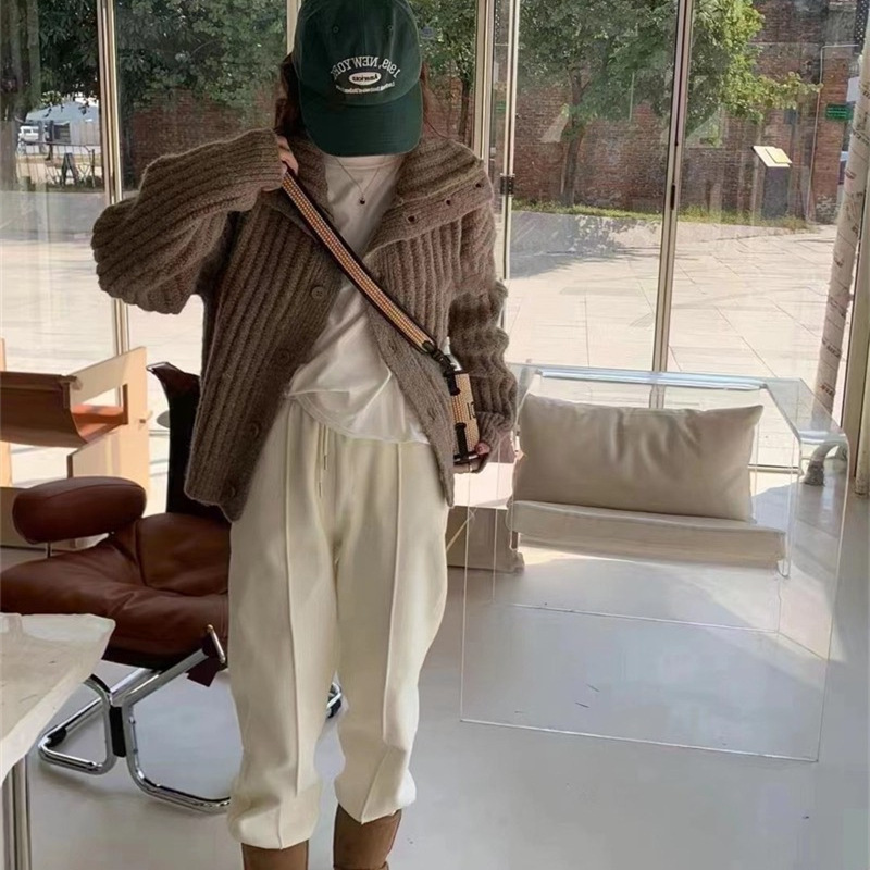 A new retro high-neck single-breasted knitted cardigan for women in the autumn and winter of 2025, with a loose and laid-back thick stitch and striped sweater coat Application Scenario