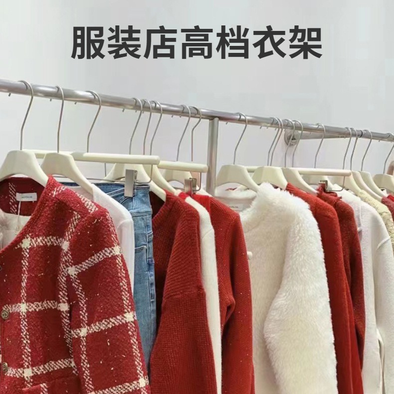Wholesale milky white solid wood coat hangers and clips, thickened clothes hangers for women's clothing stores, and wooden clothes and trouser racks for children's clothing stores details Picture
