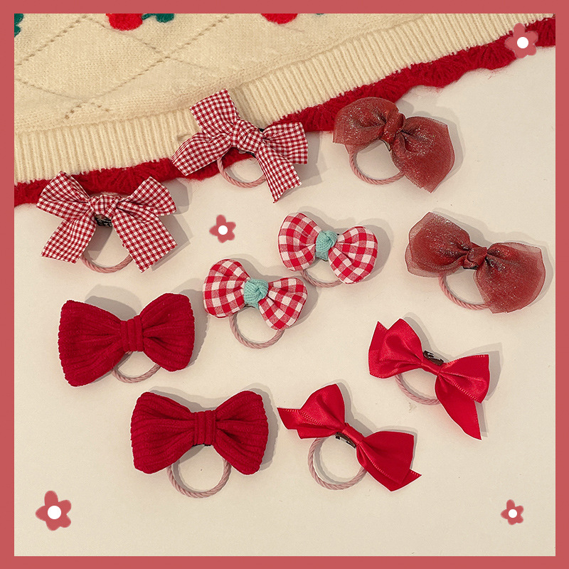 Cute pink hair tie for children. It won't hurt girls' hair. The hair tie is highly elastic and durable. Little girls can tie their hair in a ponytail details Picture