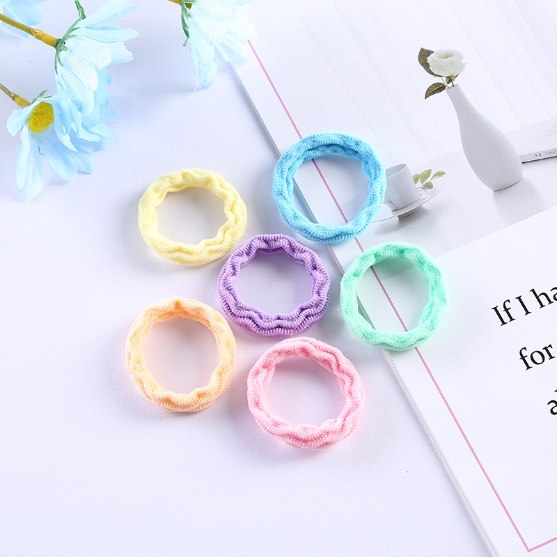 Japanese and Korean jacquard towel rings, children's colorful seamless hair ties, colorful simple high-elasticity hair ties, 100 pieces per bag Application Scenario