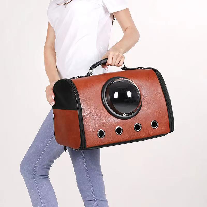 Wholesale of portable pet bags, horizontal cat bags, space capsule large space pet backpacks, PU mobile transparent portable portable bags for going out details Picture