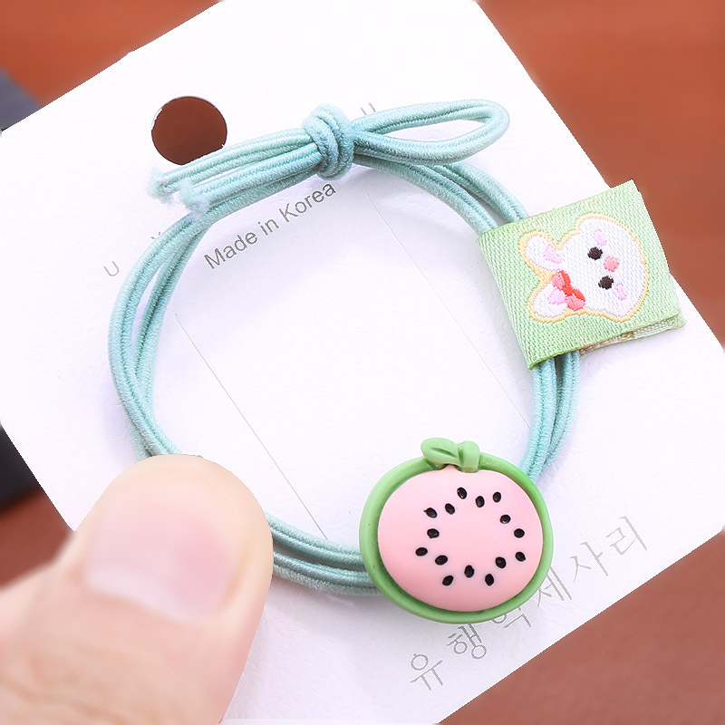 Korean version colorful cute hair tie, fruit label, rubber band, pitaya hair band, cartoon female student ponytail hair accessory Application Scenario