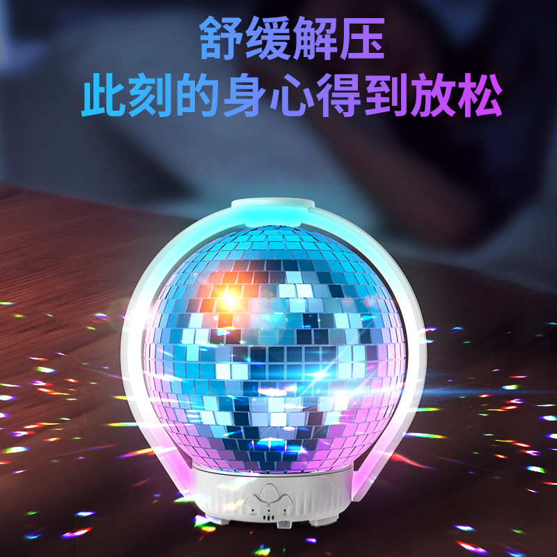 Wholesale seven color rotating laser ball ultrasonic automatic spray humidifier Aromatherapy machine upgrade version can put essential oil full figure