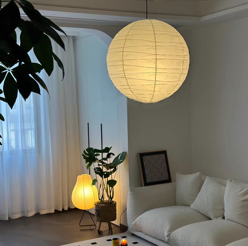Japanese wabi-sabi style paper lamp by Isamu Noguchi, bedroom, dining room, guesthouse, living room, clothing store, atmosphere, round rice paper chandelier