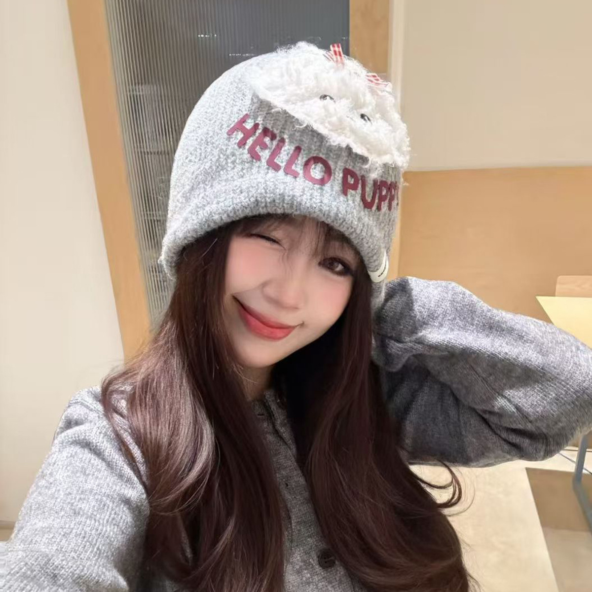 Winter outdoor warm, casual and fashionable cartoon woolen hat, windproof and ear-protecting knitted hat for women