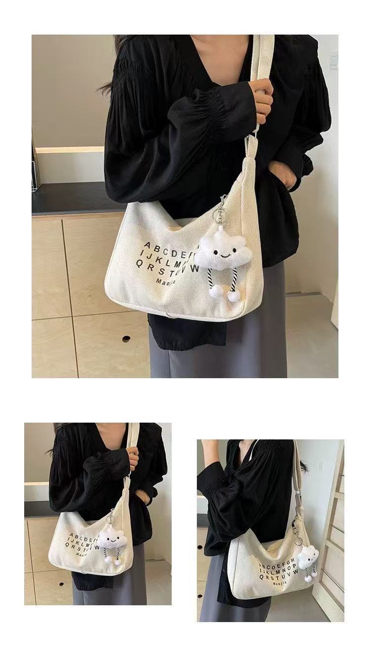 休闲帆布斜挎包女2025新款大学生上课潮牌小众百搭通勤单肩饺子包详情14