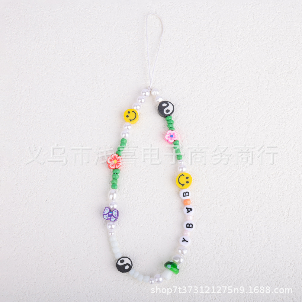 New colored rice bead mobile phone chain from ins in Europe and America, pearl smiling face beaded heart-shaped mobile phone accessory pendant for women Item Picture
