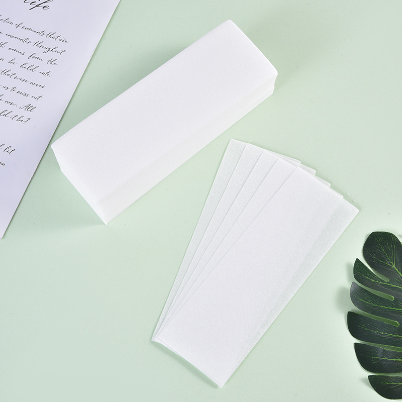 Depilatory cloth disposable thickened non-woven depilatory paper depilatory wax assisted with depilatory cloth depilatory cream assisted Specification drawing
