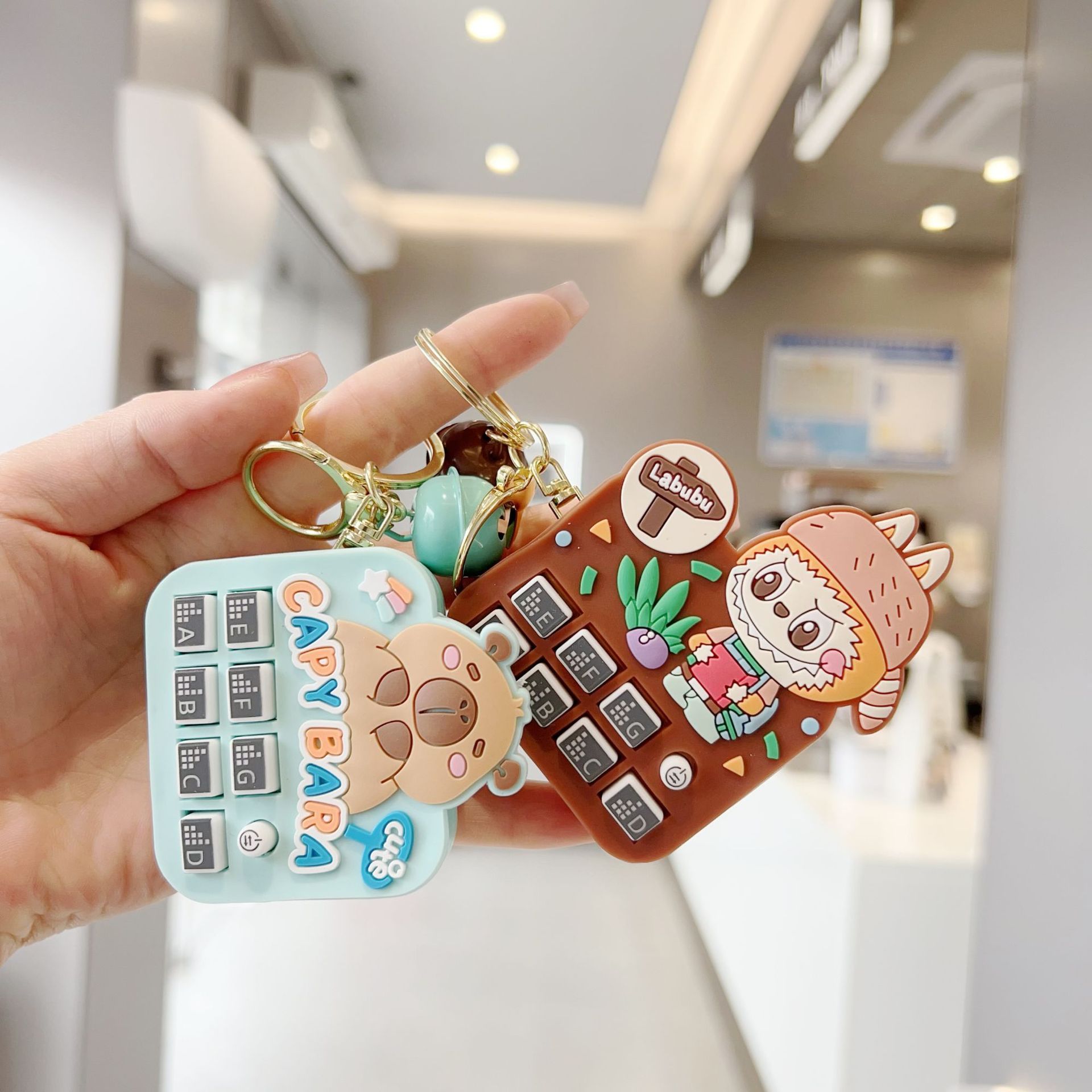 Mini disc player, keychain, musical instrument, toy, cartoon animal, rhythm machine, car key, pendant, creative gift details Picture