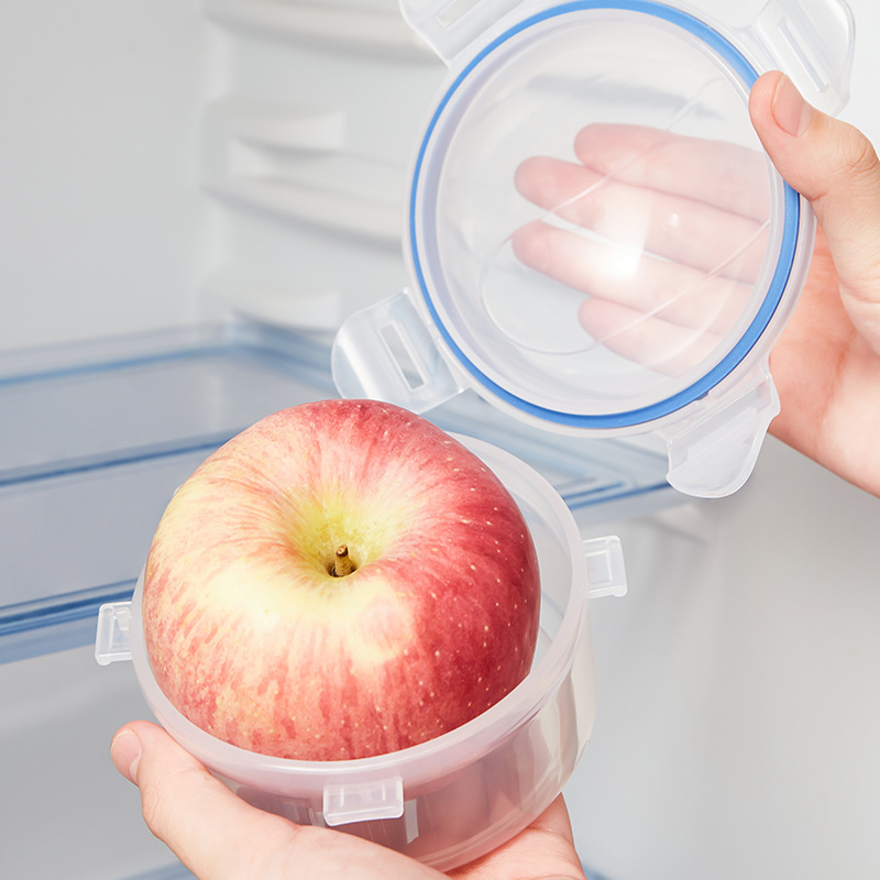 Transparent fruit preservation box, apple storage box, household round sealed box with lid, onion box, microwave heating rice Application Scenario