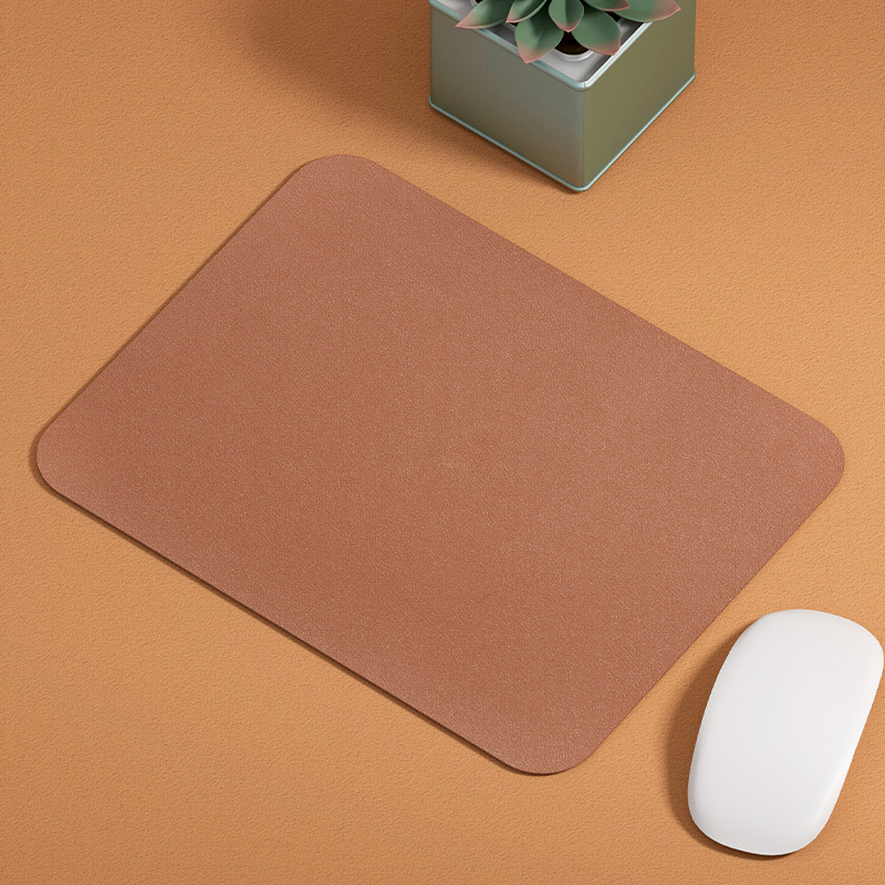 Simple leather mouse pad, small advertisement table pad, nail pad, computer notebook, office and game mouse pad Application Scenario