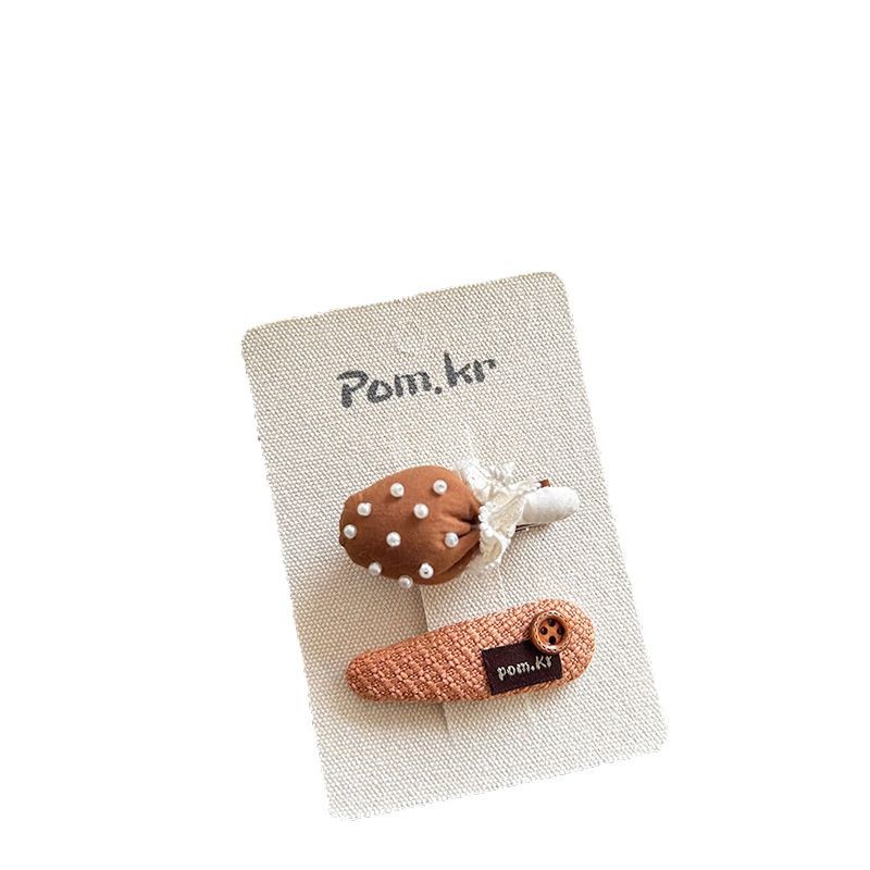 2025 New cartoon and cute fabric cotton stuffing children's rabbit embroidered pom-ball hair clip, cute girls' fringe seaside clip Item Picture